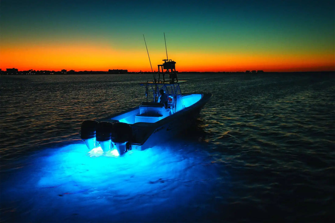 Center Console coming into port at sunset with blue underwater lights illuminated