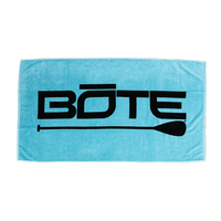 Blue towel with black 'BôTE' logo on a white background