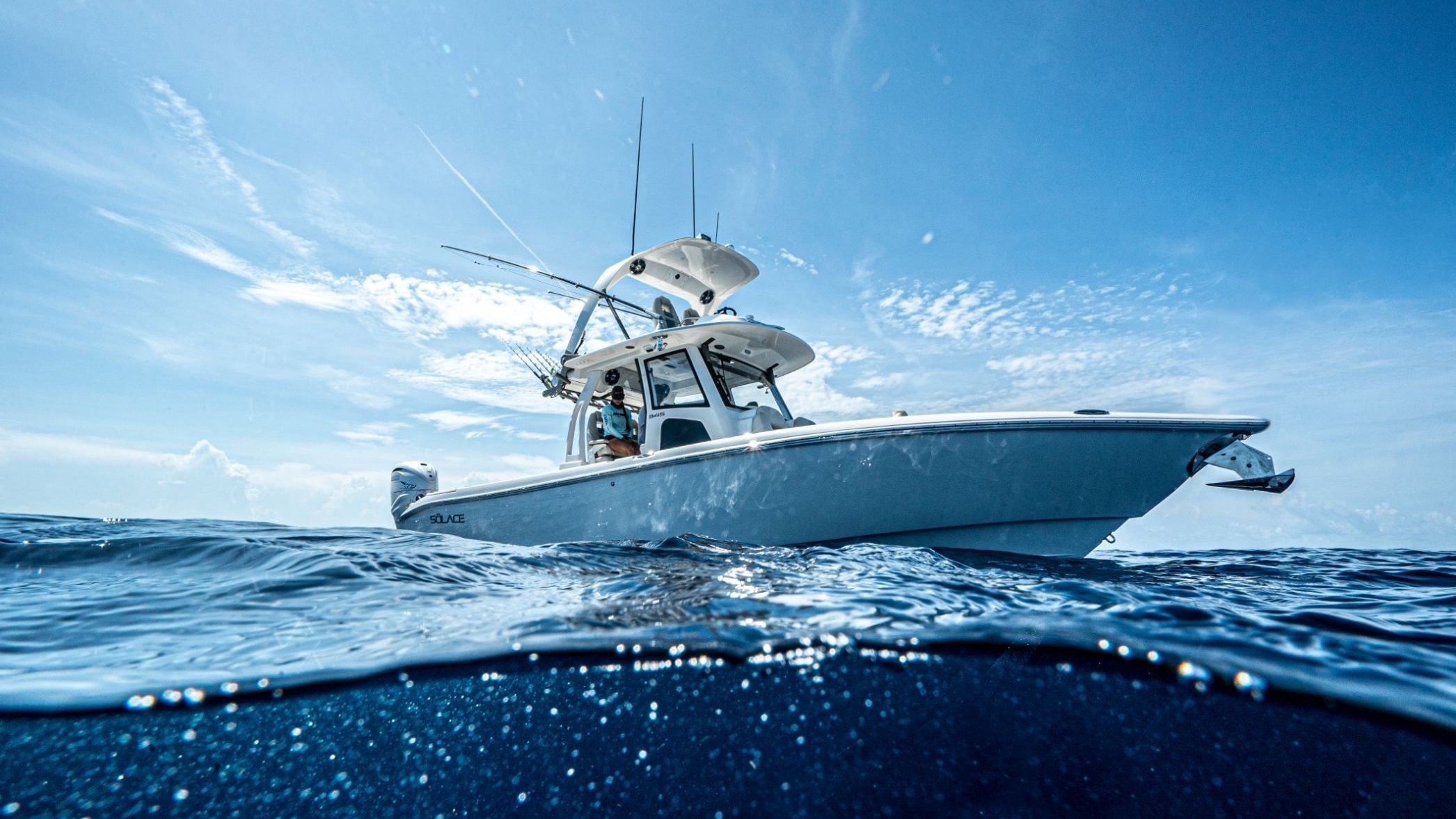 Boat on the water with a clear blue sky